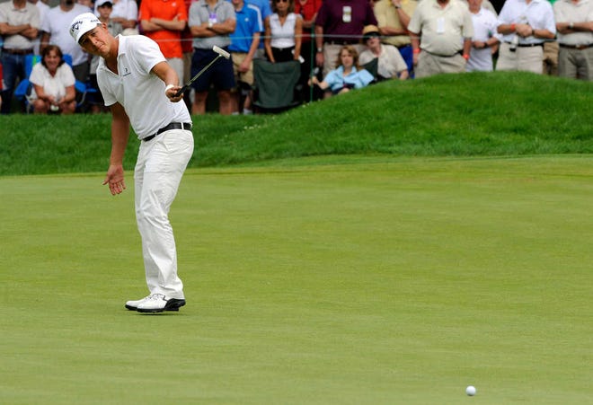 Frederik Jacobson watches his birdie putt roll toward the ninth hole during Sunday's final round of the PGA Travelers Championship in Cromwell, Conn. Jacobson won the tournament.