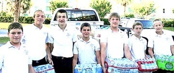 Chris Woods, from left; John Fortus, Matt Schroeder, Jimmy Partel, Michael Woods, Alex Sarris and Ethan Maronel with items collected for Alabama relief. Contributed photo