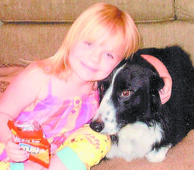 Natalie Cooper, 4, with her best friend Chase.