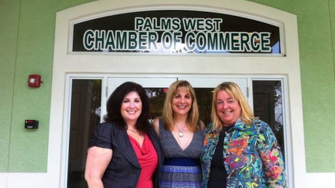 Palms West Chamber of Commerce marketing manager Mary Lou Bedford (from left), chamber CEO Jaene Miranda, and Palms West Community Foundation director of development Maureen Gross in front of the chamber headquarters in Loxahatchee Groves. Workshops, mixers and networking events are held at the headquarters each month.