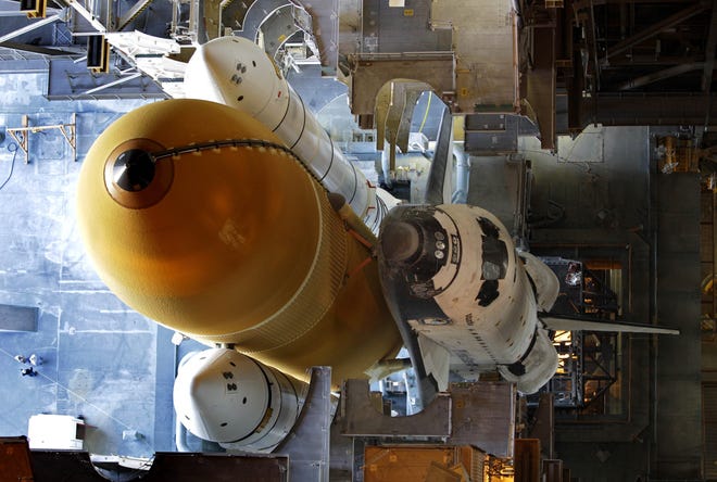 Space shuttle Atlantis is seen from the 34th floor in the Vehicle Assembly Building before rolling out to Launch Pad 39A at the Kennedy Space Center in Cape Canaveral, Fla., Tuesday, May 31, 2011. Atlantis will make the final flight ever by a space shuttle in just five weeks to end the 30-year program. It heads to the launch pad Tuesday night for a July 8 liftoff; the three-mile trip from the hangar should be completed by the time Endeavour lands at 2:35 a.m. (AP Photo/Chris O'Meara)