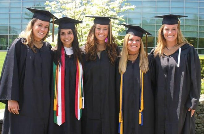 Milford resident Jordan Boucher, center, poses with her friends at Bryant University's 148th graduation ceremony held May 21. Boucher received a bachelor's degree in business administration, marketing.