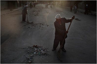Egyptians swept the streets at sunset on Wednesday after intense conflicts between protesters and the police in Cairo.