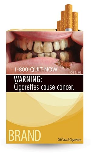 This image provided by the U.S. Food and Drug Administration on Tuesday, June 21, 2011 shows one of nine new warning labels cigarette makers will have to use by the fall of 2012. In the most significant change to U.S. cigarette packs in 25 years, the FDA's the new warning labels depict in graphic detail the negative health effects of tobacco use.