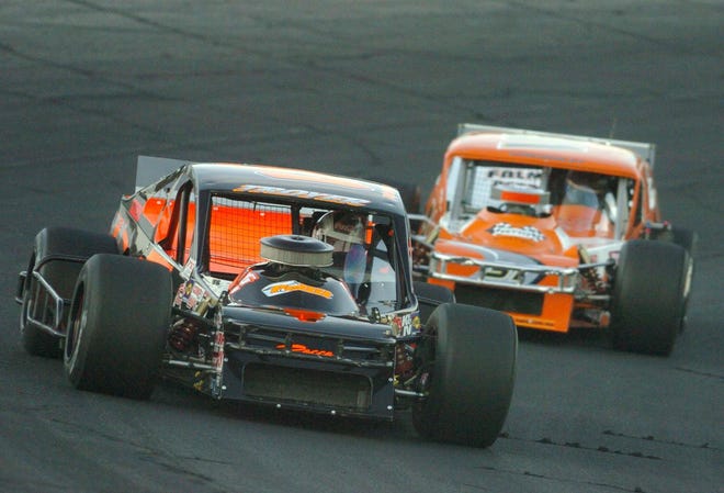 Keith Rocco driving the 57 and Ryan Preece driving the 31 car head to the finish during the Sunoco Modifieds at Thompson International Speedway. Rocco finished first.
