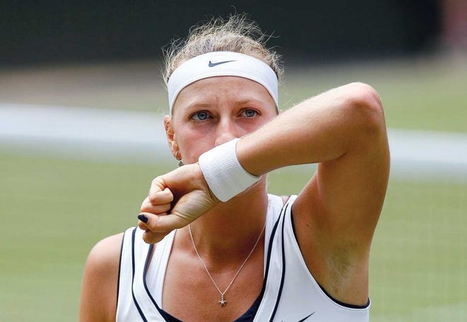 Petra Kvitova had a few reasons to sweat out her match against
Victoria Azarenka on Thursday at Wimbledon.