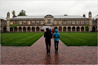 Prospective students touring the campus of Washington University in St. Louis. One expert suggests that students not borrow any more than their annual salary will be when they graduate.