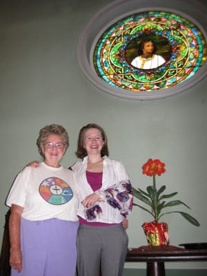 Parish committee co-chairman Lydia Tatro, left, and the Rev. Christana Wille McKnight, hope to see the First Unitarian Church of Norton filled again with parishioners.