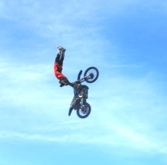 Slade Waltman is head-over-heels during his motocross performance at the Brockton Fair on July 4, 2011.