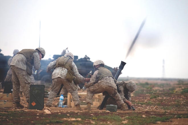 A group of Marines work on their squad movement skills during African Lion 2011. During the exercise U.S. and Moroccan forces trained on different types of military training including command post, live fire, peacekeeping operations, disaster response, aerial refueling and low-level flight training.