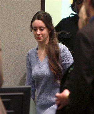 Casey Anthony enters the courtroom for her sentencing on charges of lying to a law enforcement officer at the Orange County Courthouse Orlando, Fla., Thursday, July 7, 2011. Anthony was acquitted of murder charges.