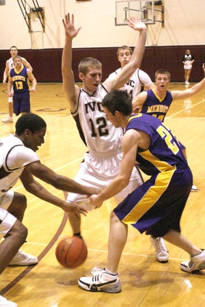 Jared Johnson defends a Mendota Trojan during his playing days at IVC.
