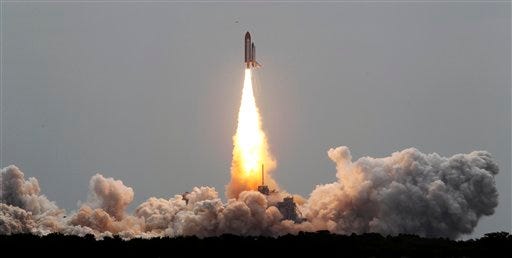 The space shuttle Atlantis lifts off from the Kennedy Space Center Friday, July 8, 2011, in Cape Canaveral, Fla. Atlantis is the 135th and final space shuttle launch for NASA. (AP Photo/Terry Renna)