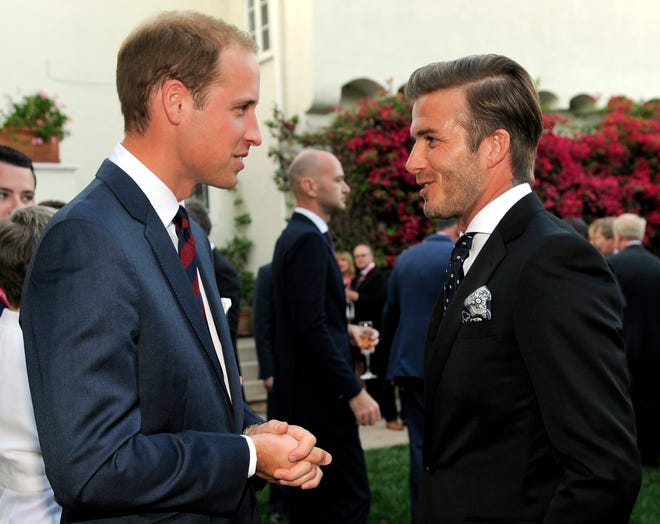 ORG XMIT: CACP113 Prince William, Duke of Cambridge, mingles with soccer player David Beckham at a private reception at the British Consul-General's residence in Los Angeles, Friday, July 8, 2011. (AP Photo/Chris Pizzello, Pool)