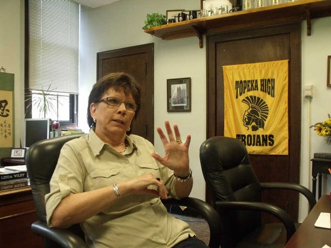 Linda Wiley, principal of Topeka High School, discusses the changes the school will undergo in the coming months to address low student scores on the state assessment tests.