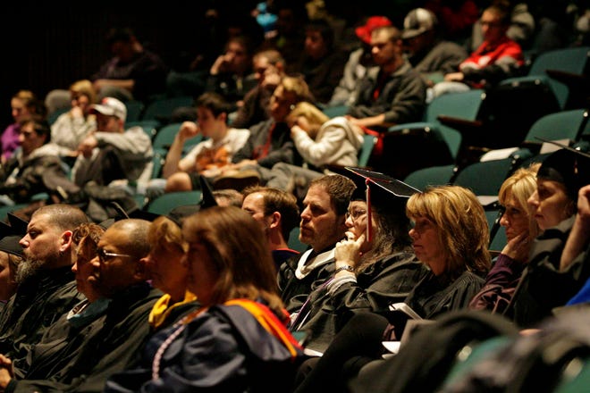 Faculty, students and guests listen Wednesday, March 2, 2011, during the Charter Day Convocation in the Maddox Theatre at Rockford College.