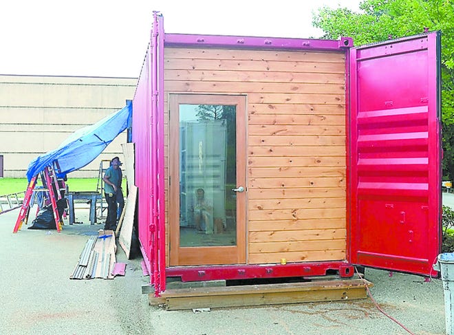 Flagler College students are turning this shipping container into a rehab room for a quadriplegic man. The work is being done in the parking lot of The St. Augustine Record. By PETER WILLOTT, peter.willott@staugustine.com