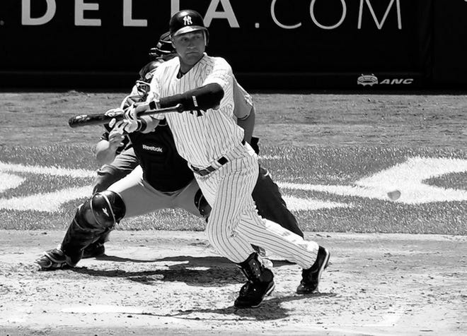 Derek Jeter lays down a bunt for his 3,004th hit on Sunday, a day after he went 5-for-5 and homered for his 3,000th hit.