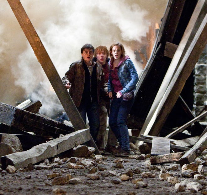 Daniel Radcliffe, Rupert Grint and Emma Watson in the final film of the fantasy adventure series,"Harry Potter and the Deathly Hallows Part 2."