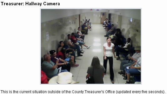 The above is a computer screen capture of the live picture generated by a camera outside the Shawnee County Treasurer's office. County officials are considering ways in which the cameras can be used to alert people waiting in line as to when their service number is about to be called. The live view can be seen at http://www.snco.us/treasurer/hallway_camera.asp