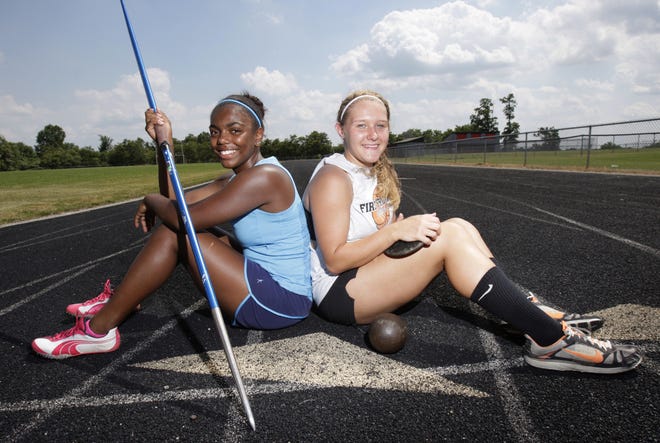 Charmaine Gamble (left), 15, will compete in the 100-meter hurdles and javelin, and her best friend, Kaley Fraelich (right), 15, will compete in the shot put, discus and javelin events at the AAU Junior Olympics in New Orleans.