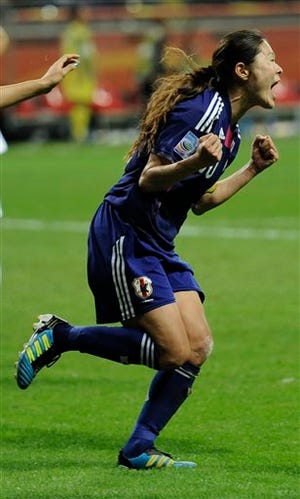 Japan's Homare Sawa celebrates scoring her side's second goal during the final match between Japan and the United States at the Women?s Soccer World Cup in Frankfurt, Germany, Sunday, July 17, 2011. (AP Photo/Martin Meissner)
