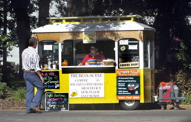 Savannah Morning News file photo The Bean Scene coffee and lemonade cart on Wright Square, shown here in 2005, is the rare mobile food unit allowed under city ordinance. The truck is owned by an existing business owner, Smooth's Susan Jaffie, who has access to a commercial kitchen to prepare food.
