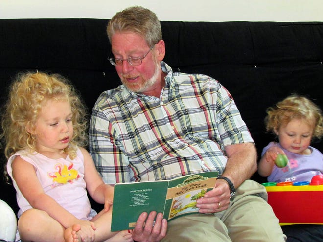 This photo provided by Dr. Fred Henretig, shows Henretig, an emergency medicine specialist at Children's Hospital of Philadelphia, with granddaughters, Violet, left, and Brett, on Sunday July 17, in Pond Eddy, N.Y. Henretig is the lead author of a study that says that children may be safest in cars when grandparents are driving instead of mom or dad. (AP Photo/Courtesy Jonathan Henretig)