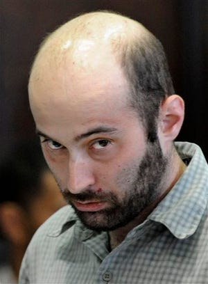 Levi Aron is arraigned in Brooklyn criminal court Thursday, July 14, 2011, in New York. Aron, 35, is charged with luring 8-year-old Leiby Kletzky to his home on Monday, and then smothering him and chopping him up when he learned that a search was under way for the missing child.