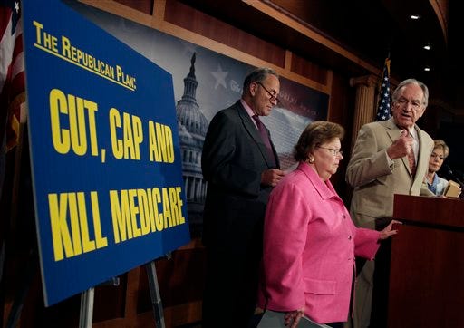 From left, Sen. Charles Schumer, D-N.Y., Sen. Barbara Mikulski, D-Md., Sen. Tom Harkin, D-Iowa, and Sen. Barbara Boxer, D-Calif., participate in a news conference to denounce the House Republicans "Cut, Cap, and Balance Act" on Wednesday, July 20, 2011, in Washington.