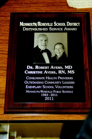A plaque like this one, given to Dr. Robert Ayers and Christine Ayers, is presented every year to local alumni honored by the Hall of Achievement.