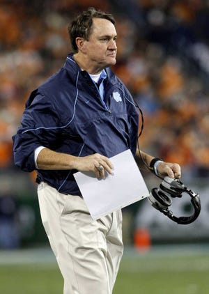 North Carolina head coach Butch Davis looks on during the third quarter of the Music City Bowl in December in Nashville, Tenn. Davis said Thursday that he plans to release his personal cell phone records to media outlets covering the NCAA investigation of the school's football program. The school had previously released records in June showing only a few calls from Davis' office and university-issued cell phone in 2009 and 2010. That prompted reporters to request records for any personal devices used for school business.