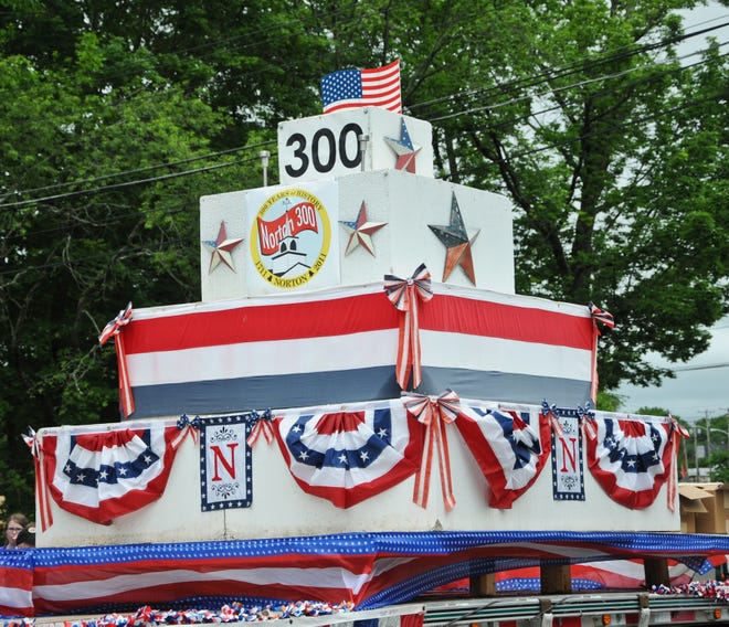 One of the last floats in the Norton Tricentennial Parade was a big birthday cake for Norton's 300th.