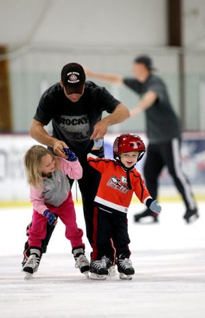 Chillaxin'On his day off, firefighter Altan Kellar said the choices were hanging out at the pool or playing hockey in the living room. But when he saw an "open skate" sign at The Chiller rink at Easton, he took his children Jamison Elliot, 5, left, and Ozzy Kellar, 2, for a spin to beat the heat.