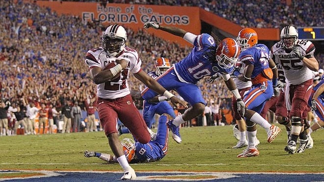 Marcus Lattimore rushes for a touchdown during South Carolina's 36-14 win over Florida on Nov. 13, 2010.