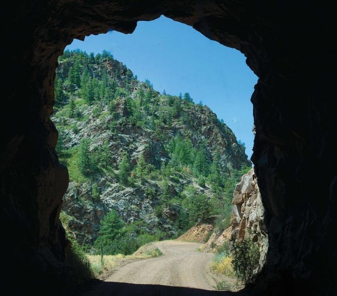 Phantom Canyon Road is framed by one of the low-clearance
tunnels along the route.