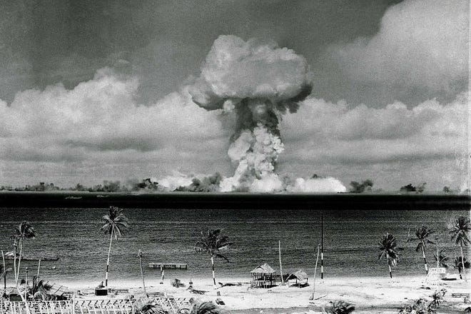 On July 25, 1946, the United States detonated an atomic bomb near Bikini Atoll in the Pacific in the first underwater test of the device.