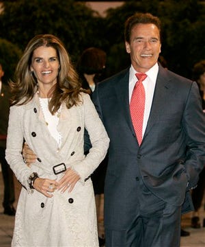 In this Nov. 8, 2006 file photo, California Gov. Arnold Schwarzenegger arrives in Mexico City, Mexico, with his wife Maria Shriver.
