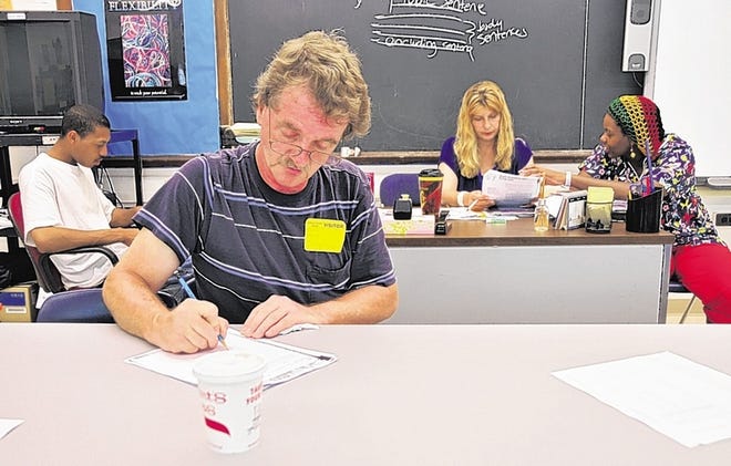 A GED diploma gives people a better chance when competing for a job. With unemployment still high, the Sullivan County BOCES started a GED class this month at the St. Johns Street Education Center in Monticello for adults like Michael Merigliano of Monticello, foreground.