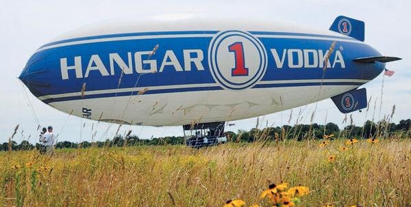 The Hangar One Vodka blimp takes off from Cape Cod Airfield Monday. It will stay on the ground in Marstons Mills today and leave Thursday morning for Concord, N.H.