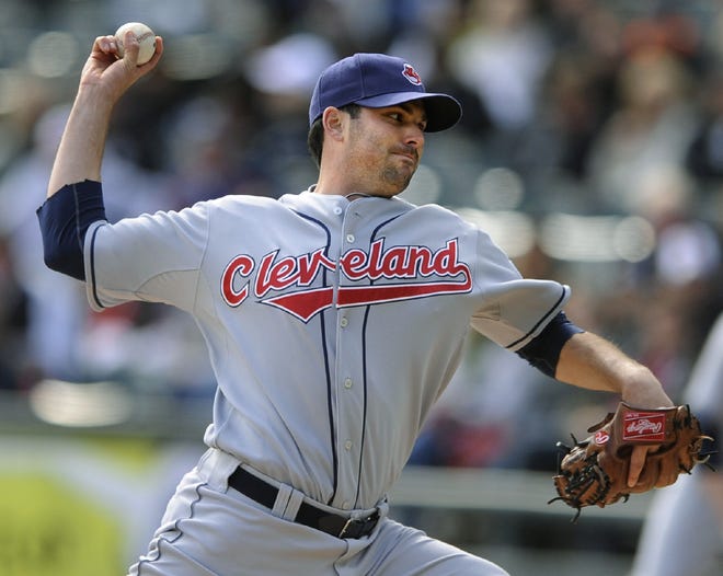 Cleveland Indians starter Justin Germano delivers a pitch against the Chicago White Sox in the first inning of Sunday's game in Chicago.