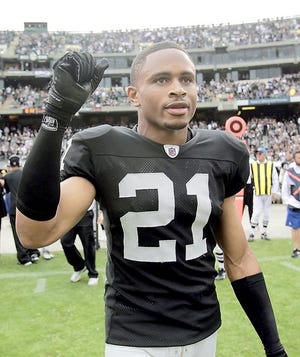 Oakland Raiders cornerback Nnamdi Asomugha stands on the field in a Sept. 19, 2010, game in Oakland, Calif. Asomugha is considered to be one of the top available free agents this year. File/AP