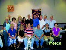 The Noon Lions Club poses for its induction of the 91st slate of officers.