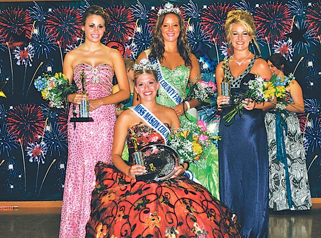 Lauren Pierson is named the 2011 Miss Mason County Queen and poses with first runner-up Taylor Coers, 2010 queen Sierra Burris and second runner-up Roxanne Parks at the queen pageant during the Mason County 4-H Fair and Junior Show. JONI ANDREWS / TIMES STAFF