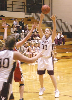 Laci Peterson looks to make a pass during her days as a Grey Ghost.