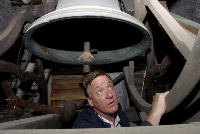 Jeff S. Lewis, Eastern Manager for Verdin Bells & Clocks check the wheel Tuesday, August 2, 2011 as he inspect the church bells at Grace Episcopal Church in Yantic.