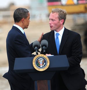 Holland Mayor Kurt Dykstra shakes the hand of President Barack Obama during the LG Chem groundbreaking ceremony July 15. LG officials extended an invitation for Dykstra to visit South Korea.