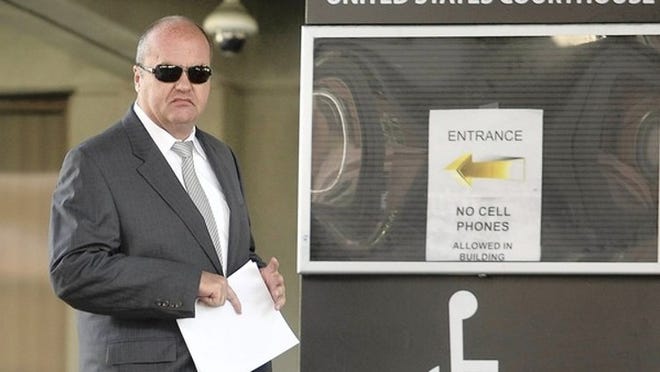 Jamie Campany, the owner of Lake Worth-based Global Bullion Exchange leaves the Federal Courthouse in Ft. Lauderdale.
