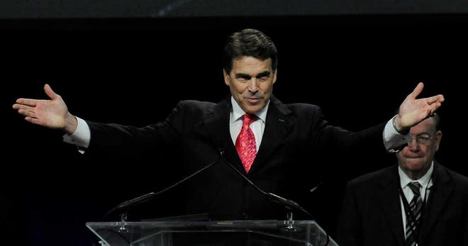 Texas Gov. Rick Perry speaks at the closing of The Response, a day long prayer and fast rally Saturday, Aug. 6, 2011, at Reliant Stadium in Houston. (AP Photo/Pat Sullivan)