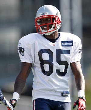 Patriots wide receiver Chad Ochocinco is all smiles during a recent practice in Foxboro.
